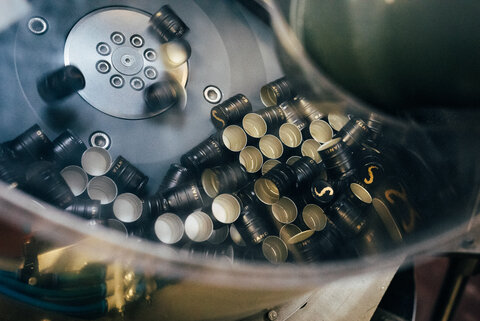 wine capsules in a filling machine